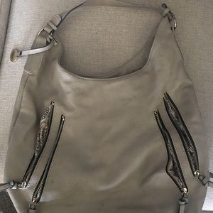 Tan hobo bag w lots of compartments